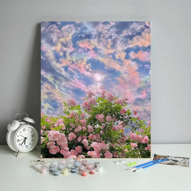 Pink carnation with colorful clouds