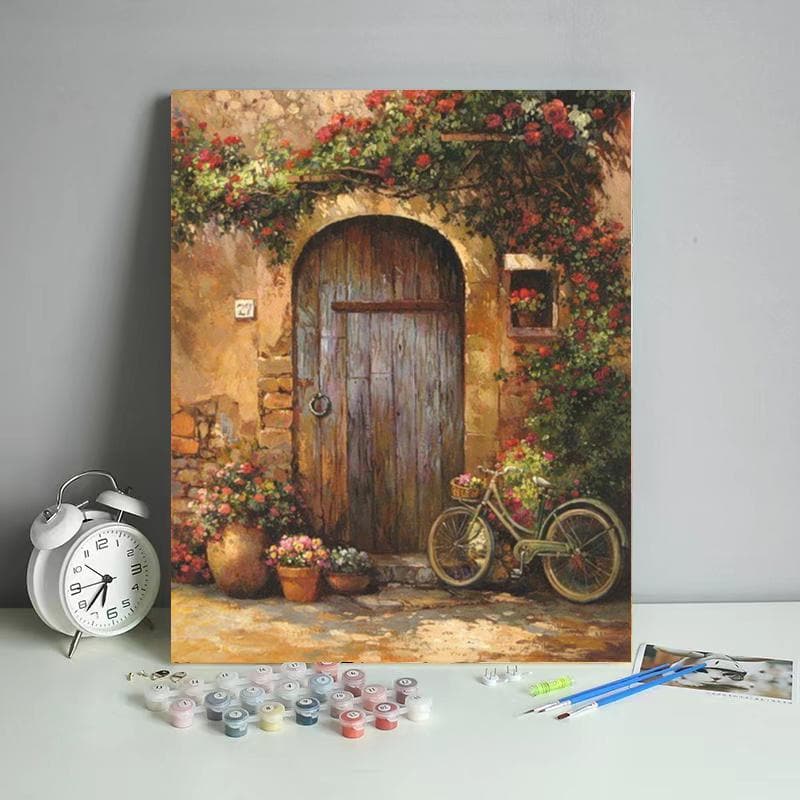 A wooden door with flowers