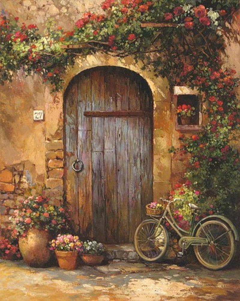 A wooden door with flowers