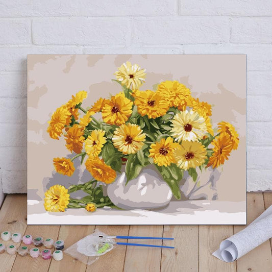 A pot of yellow chrysanthemums