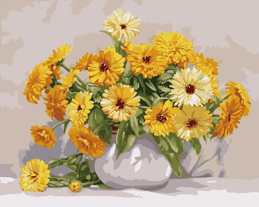 A pot of yellow chrysanthemums